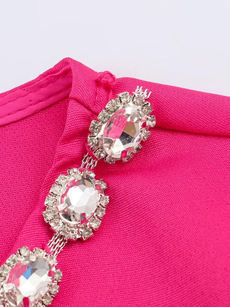 New European-style women's fashion set: stylish and versatile top and skirt set with elegant rhinestone embellishments.