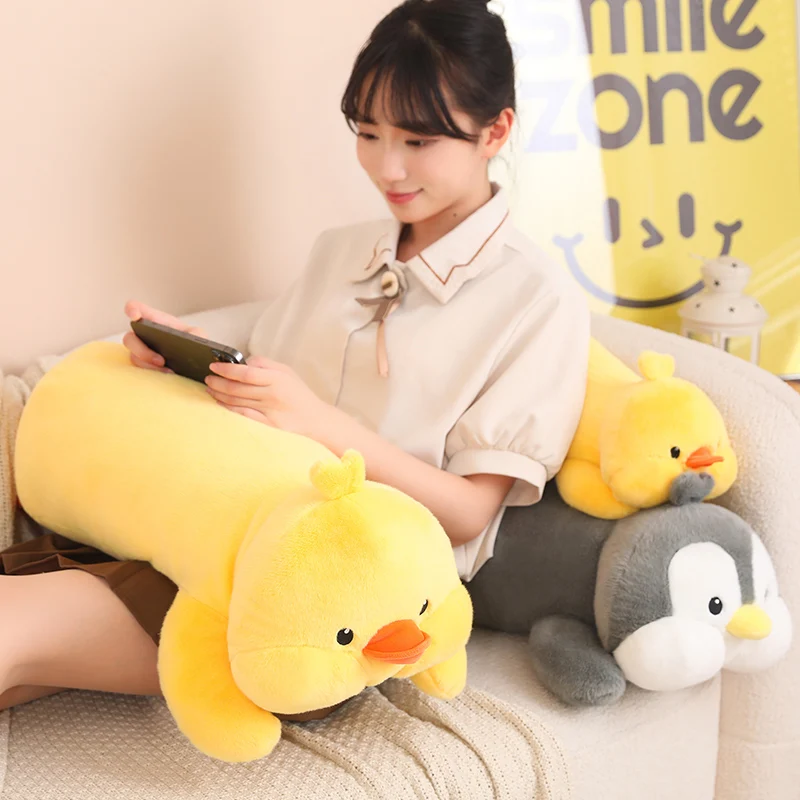 Juguete de Peluche de pingüino tumbado de gran tamaño, Animal relleno suave, pato amarillo, cojín para sofá, Peluche Kawaii, decoración de habitación, regalo de cumpleaños