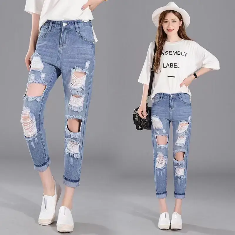 Spring and Summer New Harun ripped jeans women fashionable BF style high waist slimming street nine cropped carrot pants