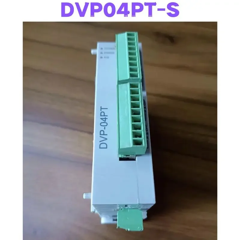 

Second-hand DVP04PT-S PLC Expansion Module Tested OK