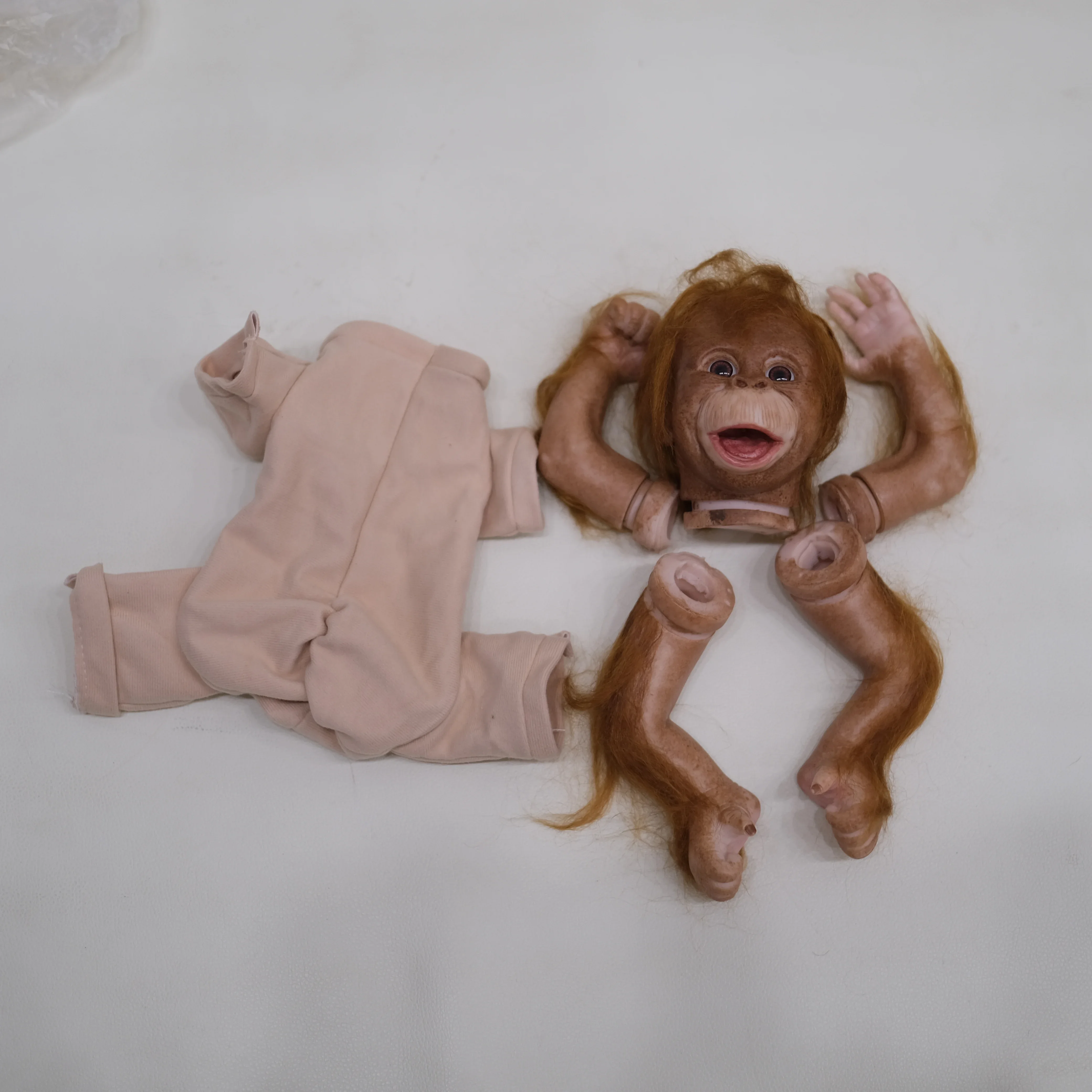 EGO 18인치 완성된 다시 태어난 원숭이 인형 크기 이미 페인트 키트 천 몸체를 가진 매우 실물 같은 아기