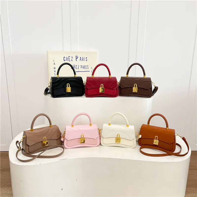 

Новая модная и высококачественная женская сумка через плечо, маленькая квадратная сумка, премиум-класса, однотонная, для хранения телефона.