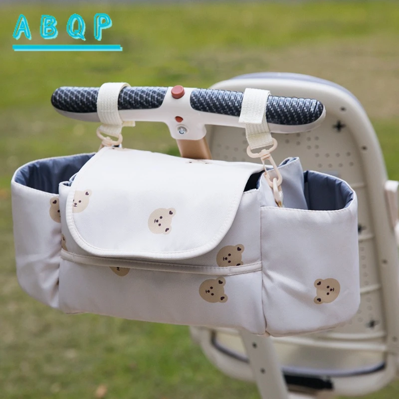 

Новая многофункциональная подвесная сумка для детской коляски с мультяшным дизайном, легкая и стильная сумка для хранения детских принадлежностей
