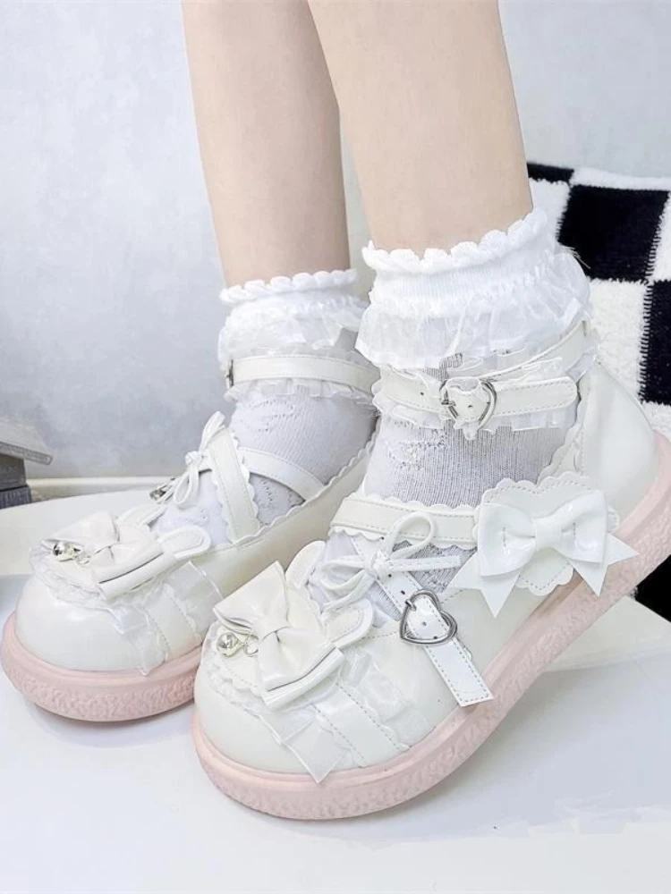 Sandali causali dolci e carini con fiocco rosa donna stile giapponese Lolita scarpe con punta tonda nastro da donna scarpe basse principessa Kawaii