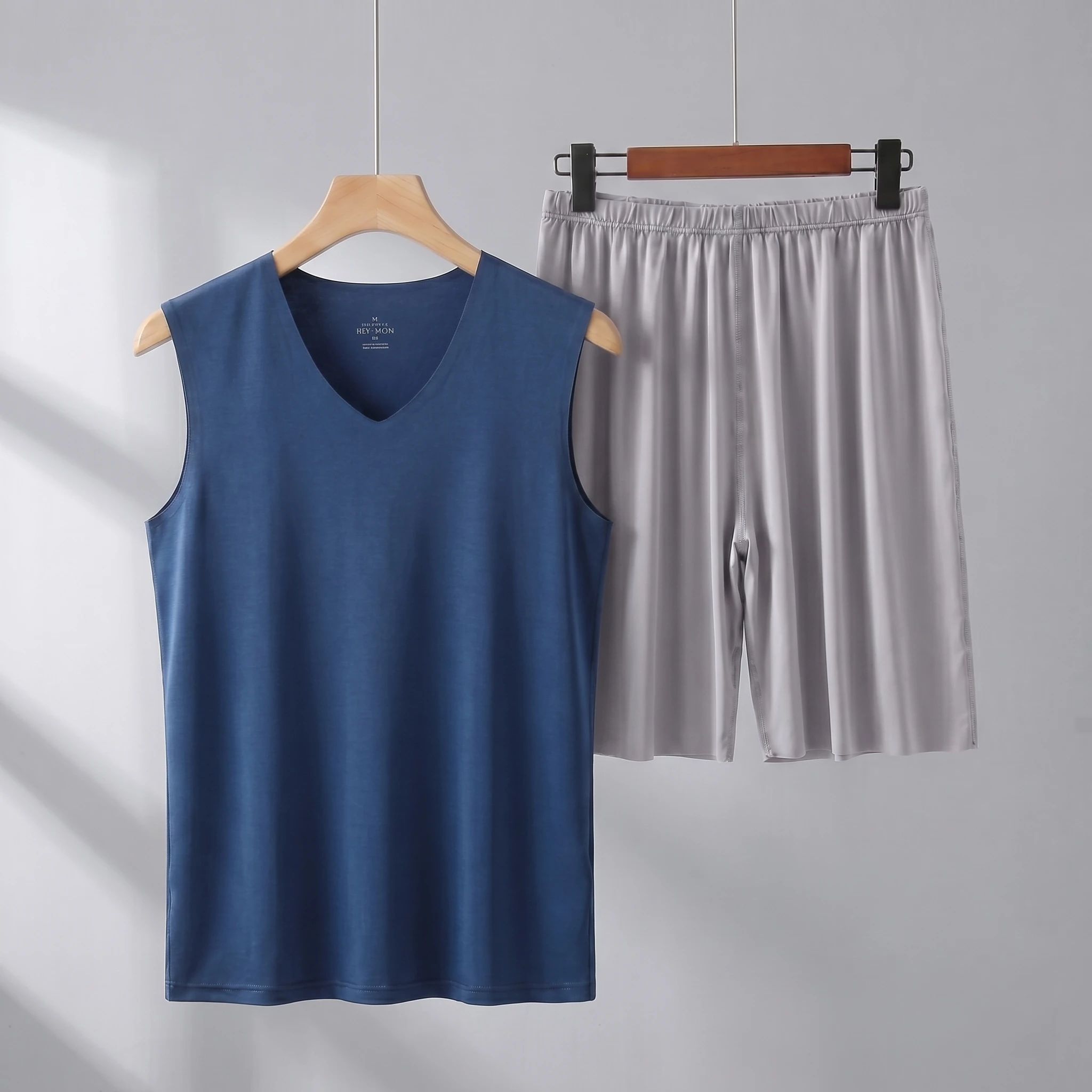 Dark blue vest + gray shorts