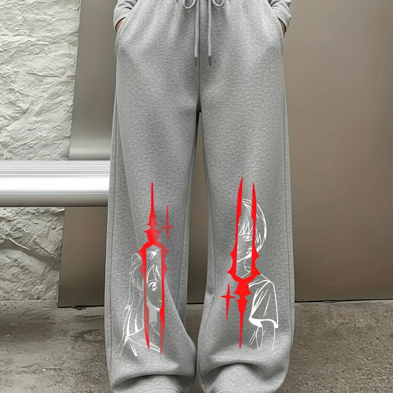 Women's wide-leg trousers featuring a red anime-style character print an elastic drawstring waist and suitable for all seasons