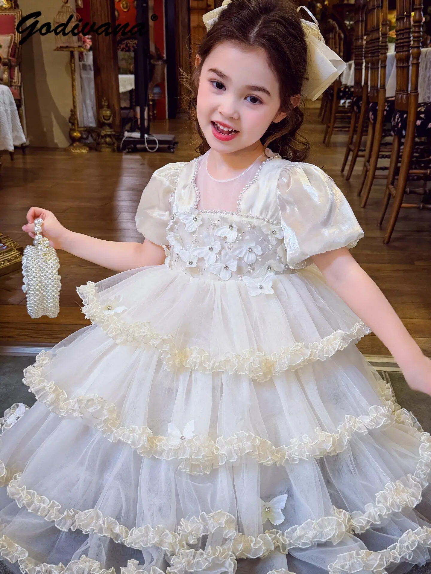 

Baby Girls Sweet 2026 Summer New Princess Dress Kids Heavy 3D Floral Pearls Bubble Sleeve Mesh Lace Trim O-neck Tutu Cake Dress