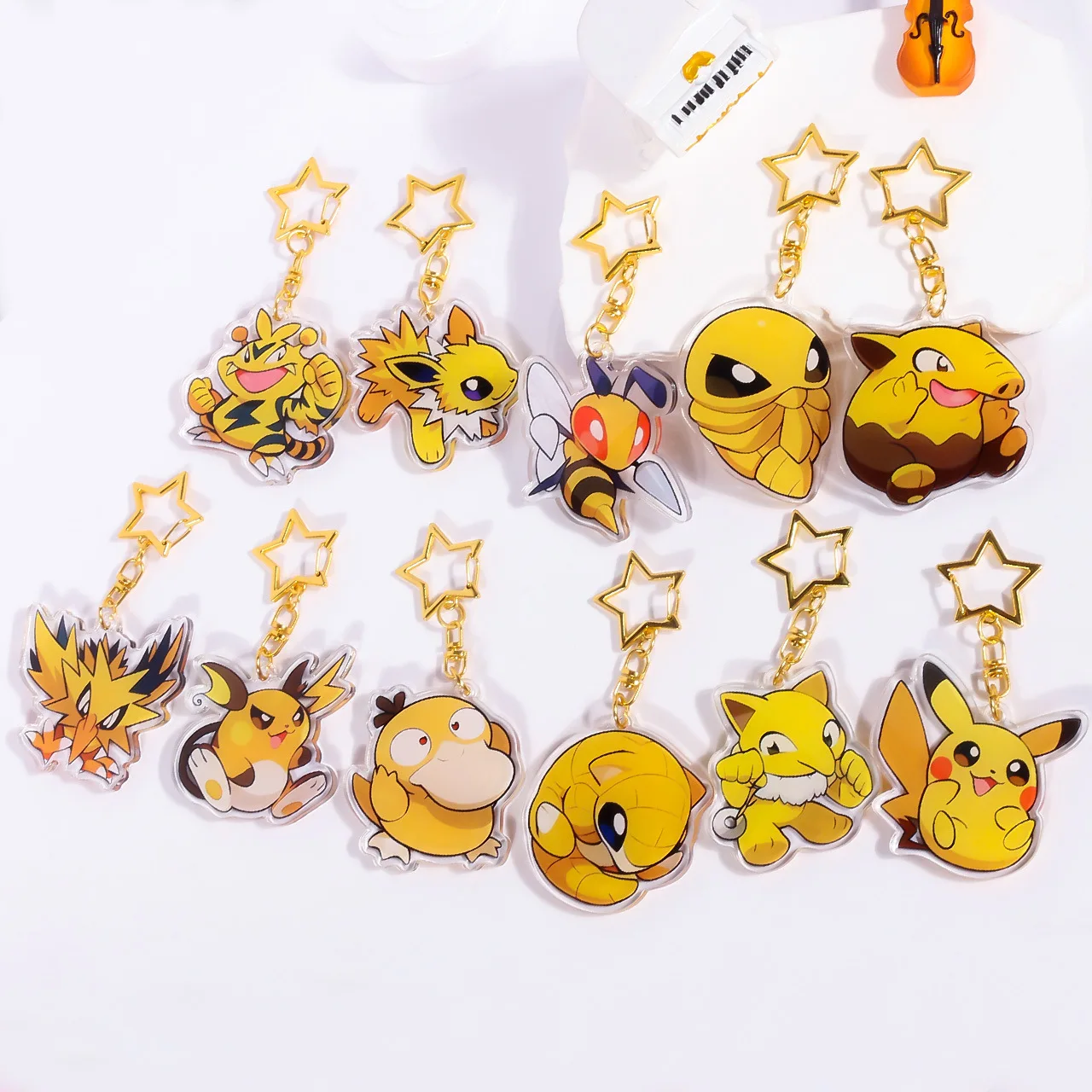 Anime Pokemon Jolteon Sandshrew Zapdos Raichu Drowzee Beedrill Psyduck acrílico llavero coche bolsa colgante regalos