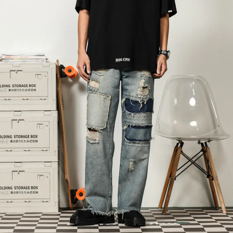 

Mens Fashion Destroyed Jeans With Patches Loose Fit Ripped Denim Pants Washed Blue Hip Hop Trousers For Male