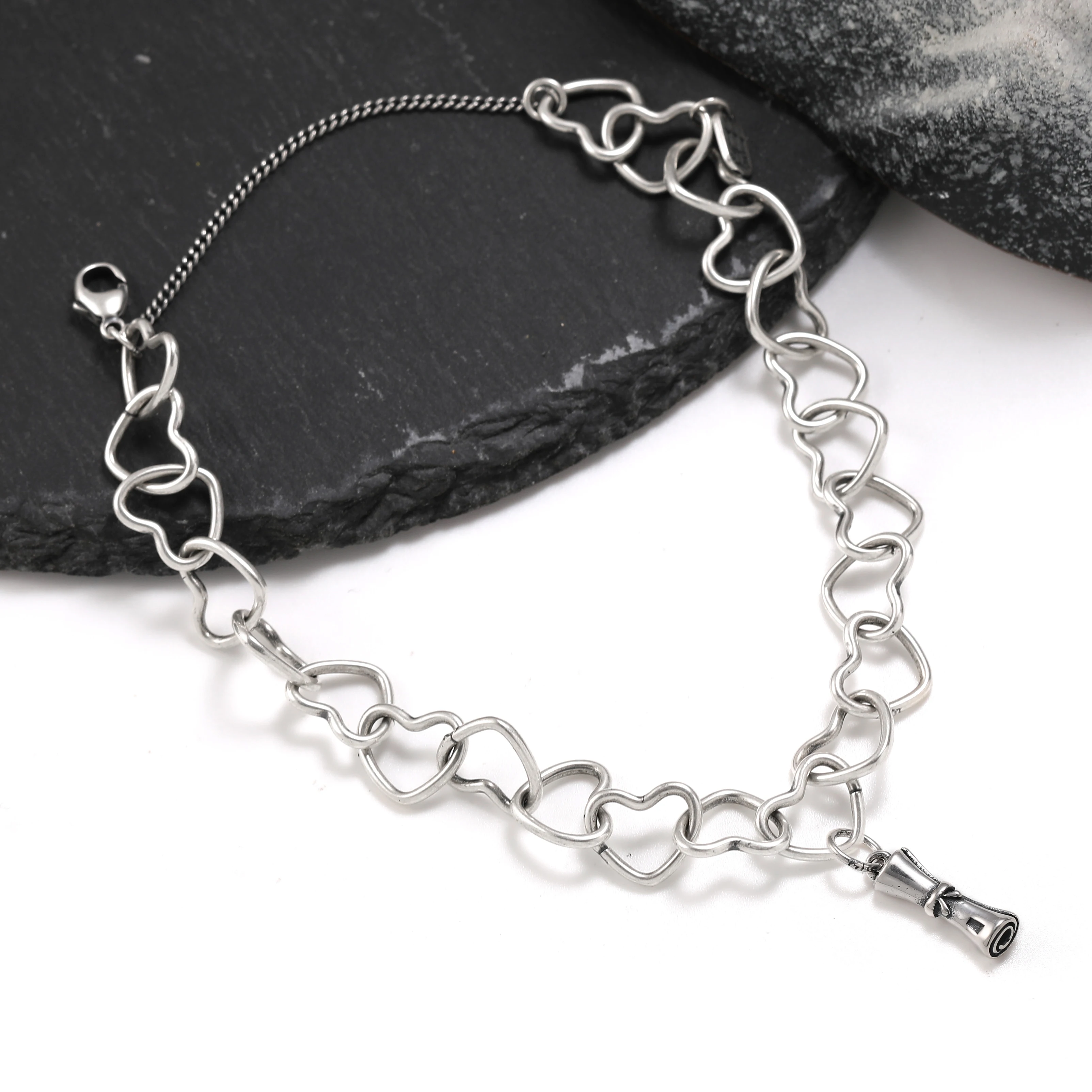 

Genuine 925 sterling silver Connected Hearts Charm Bracelet paired with a diploma pendant