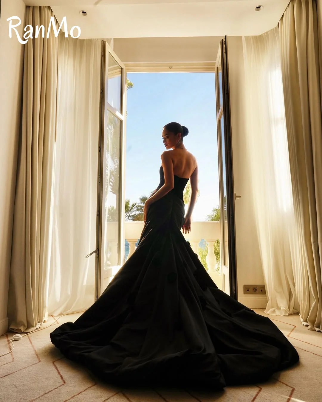 Ranmo 2025 فساتين سهرة أنيقة من الساتان الأسود بطول الأرض حورية البحر بدون حمالات بدون أكمام فستان حفلات مخصص للحفلات