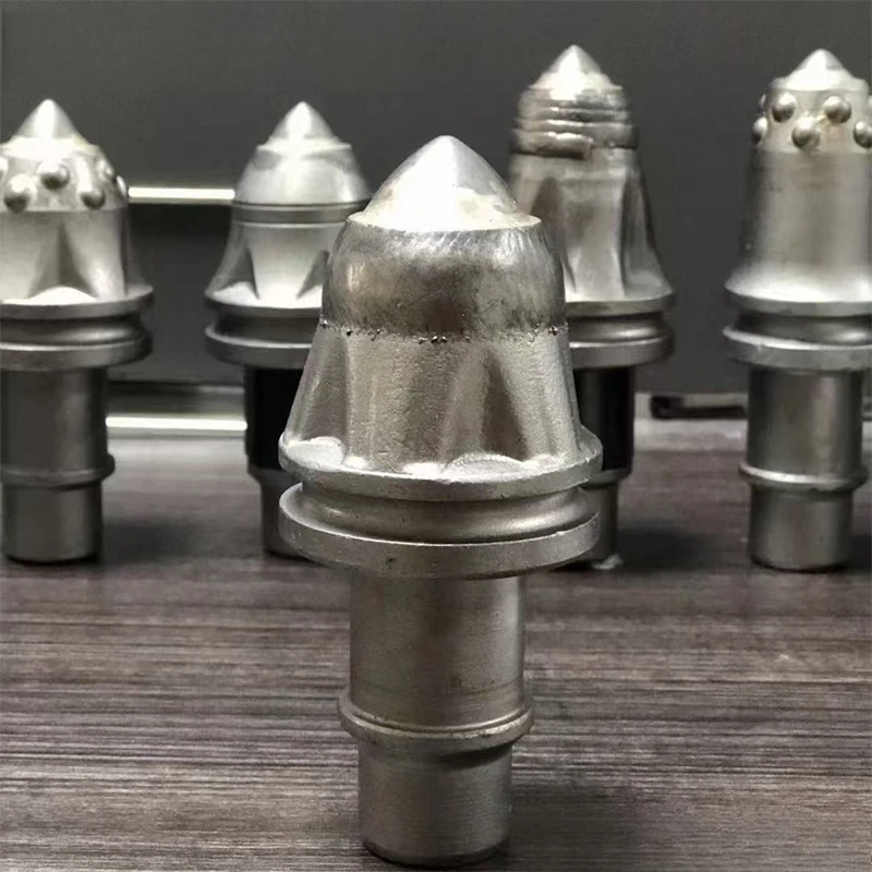 Perforatrice a spirale modificata con foro di scavo, espansione del foro del driver del palo modificato, punta da trapano a proiettile con piccone resistente all'usura