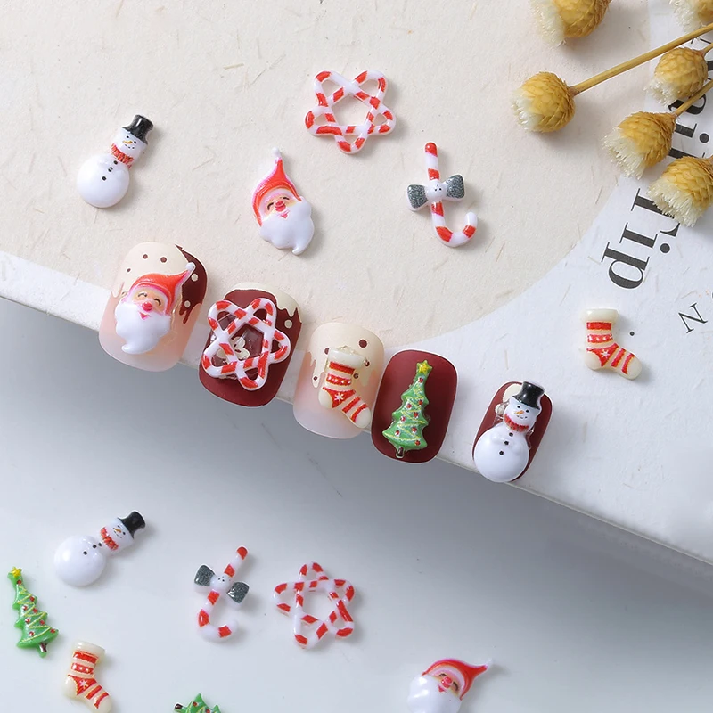 10pcs คริสต์มาสเรซิ่นเล็บอุปกรณ์เสริม 3D การ์ตูน Santa Claus Cane ถุงเท้า Snowman Nail Art Design อุปกรณ์ตกแต่ง