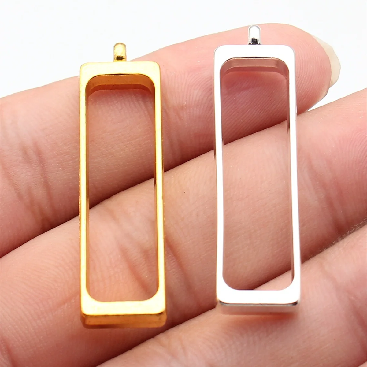 WYSIWYG 10 Stück 44x12x4,6mm 2 Farben Hohle Geometrische Kleberahmen-Serie Rechteckiger Rahmen Schmuckherstellung Zubehör