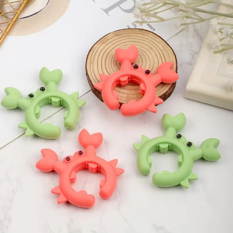 4 silicone spoon rests, cute crab-shaped spoon rest design, 4-pack silicone crab utensil holders, adjustable tool rack