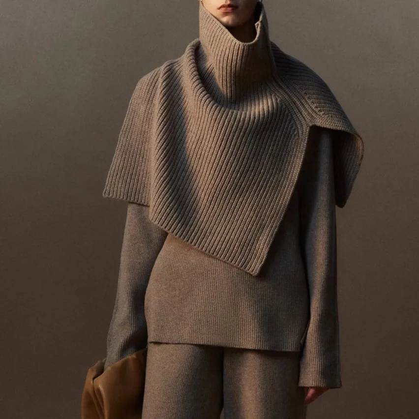 

Styling Merino Wool Cape: High-Neck, Slit Design, Multi-Way Wear.