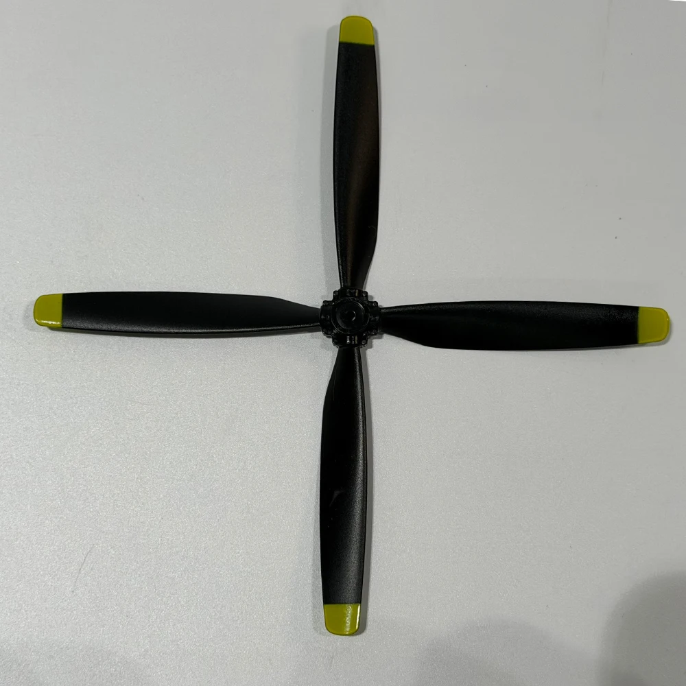 Das Zubehör für das Sayzon P51D Musting RC-Flugzeug (510 mm Spannweite) umfasst einen Propeller und ein rotes/gelbes Fahrwerk. – Detail 30