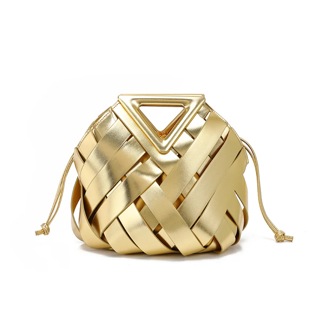 新しい野菜バスケット三角磁気バックル織り中空レディースバッグハンドバッグ、シングルショルダー斜めクロスバケットバッグ