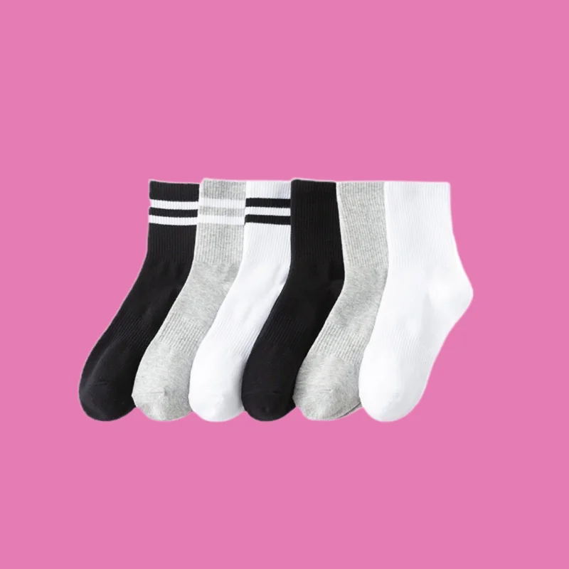 2/5 Paar neue Sommer Baumwolle Ins Trend Frühling und Herbst Stil schwarz und weiß lange Socken Sports ocken Damen Mid-Tube Socken