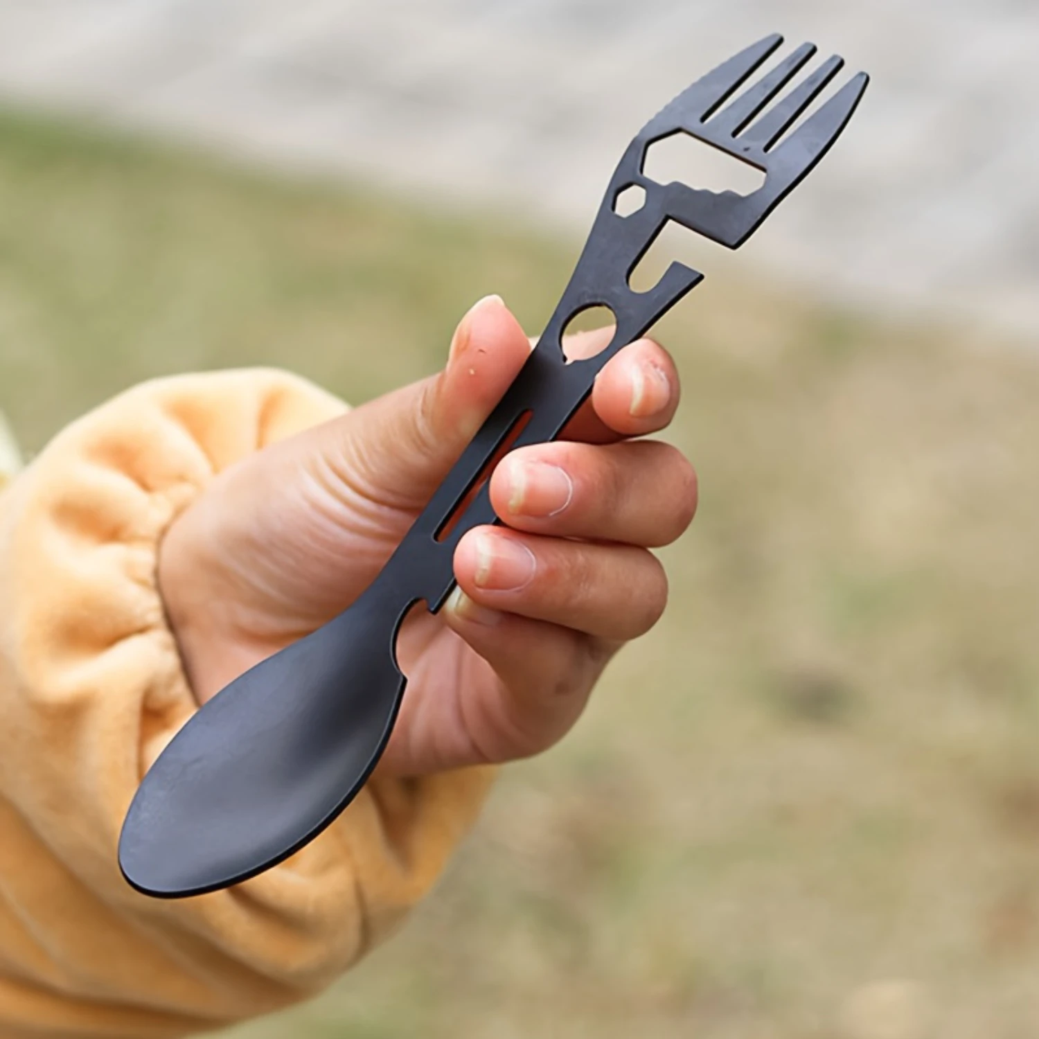 7-in-1 Multifunctional Camping Utensil - Stainless Steel Outdoor Tool with Spoon, Fork, , Wrench, Bottle Opener, Can Opener, and