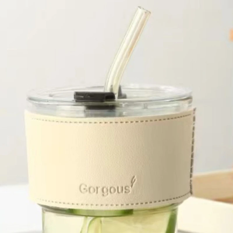 Glass iced coffee cup with lid and straw