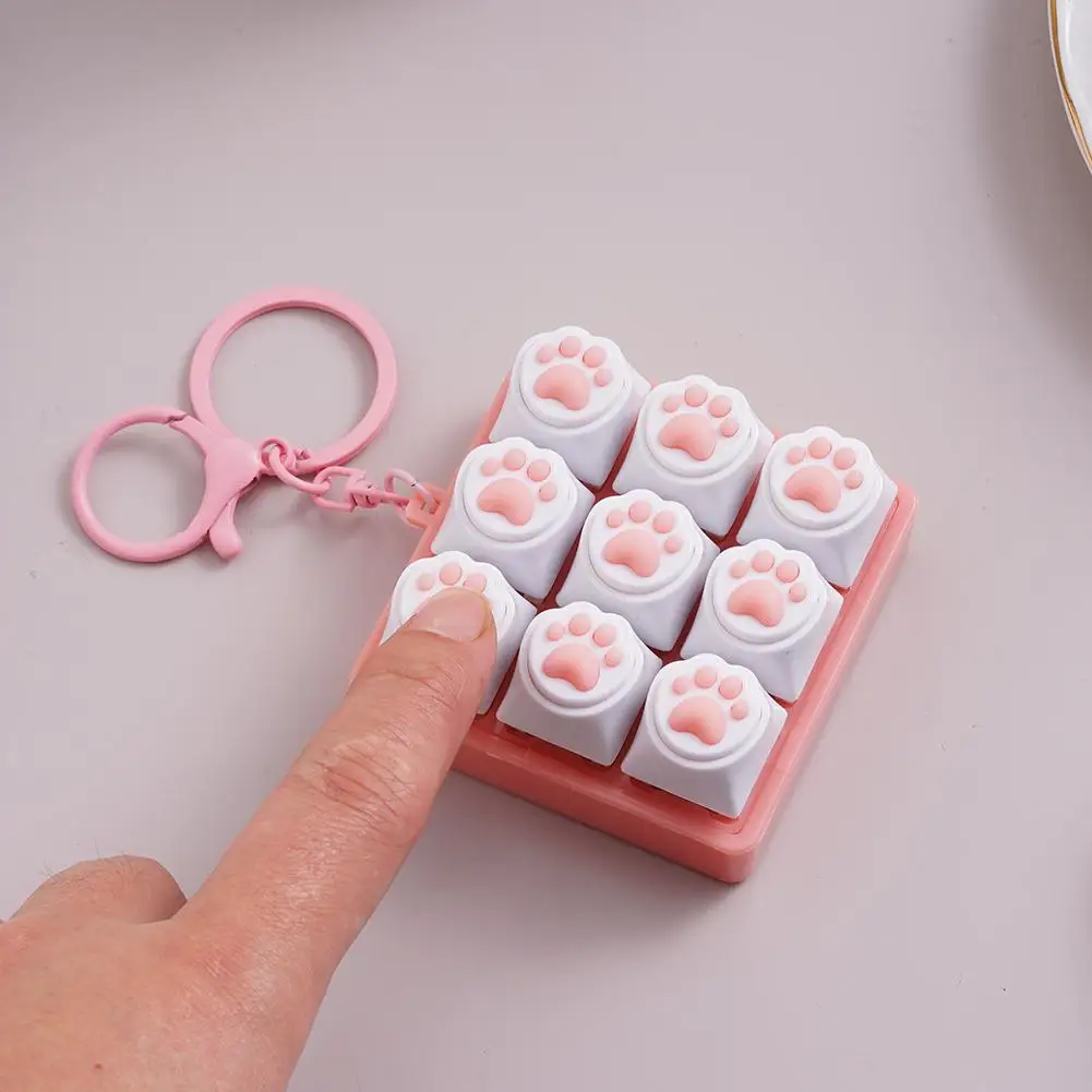 

Механическая клавиатура-антистресс с 9 клавишами в стиле кошачьей лапки, брелок и игрушка для снятия тревоги, милый декор для офисного стола
