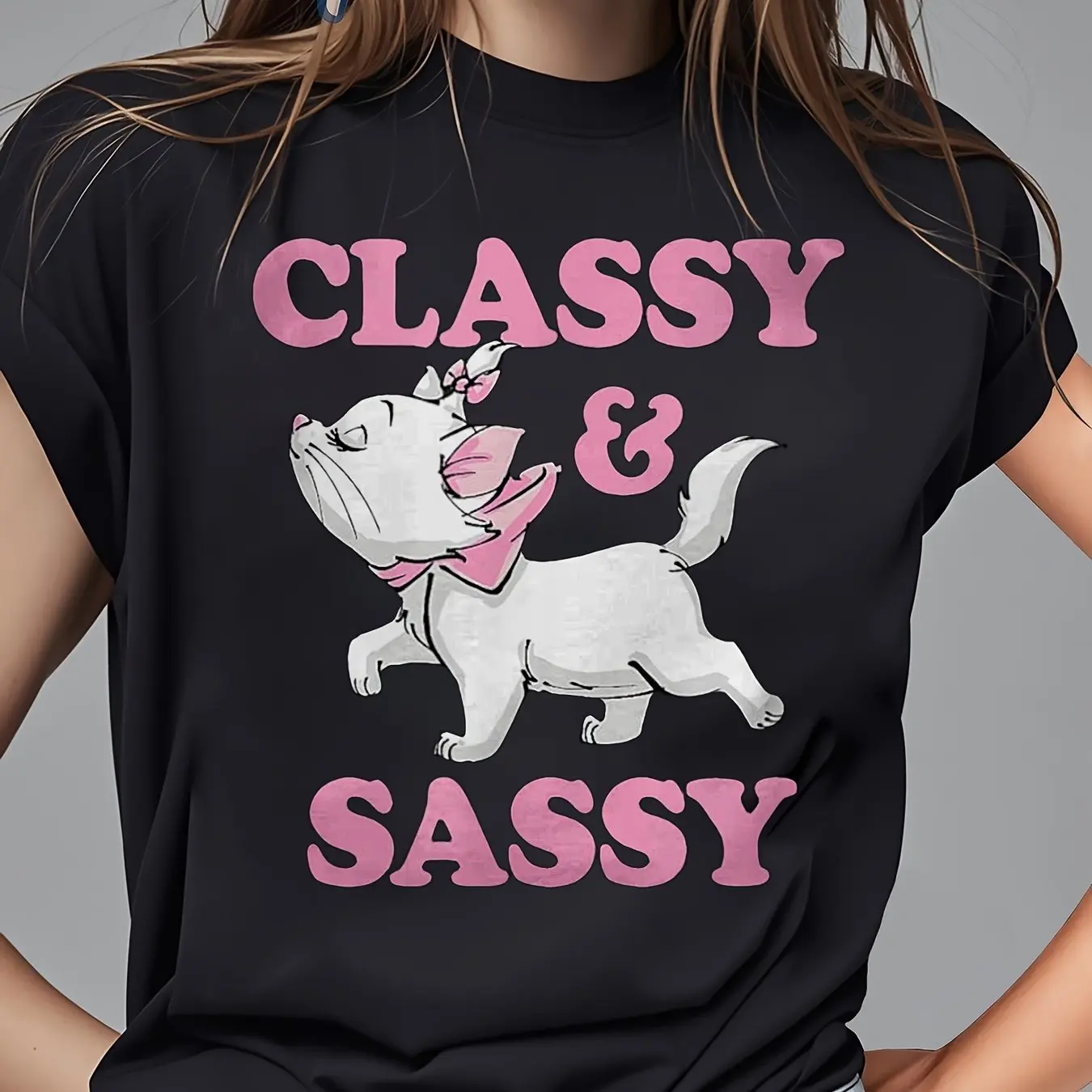 

Disney Allseas Marie Women's T-shirt - Featuring Marie Character, Pink Bow and Slogan, Short Sleeved Round Neck Black Top