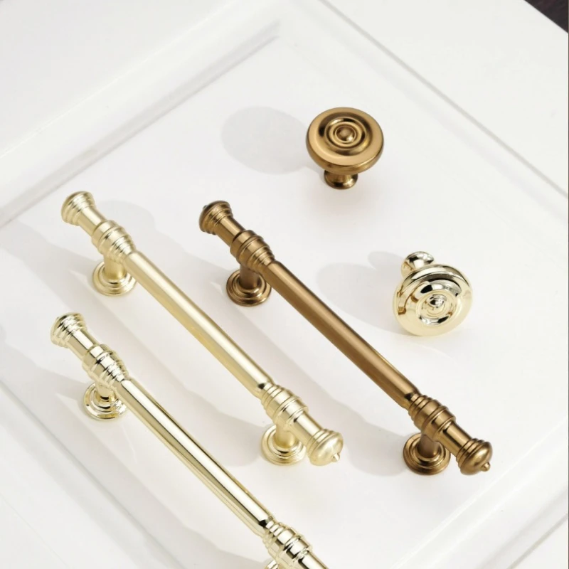 

New High - end French - style Golden Handles for Drawer Cabinets and Bathroom Cabinets Brass - colored Single hole Drawer Knobs