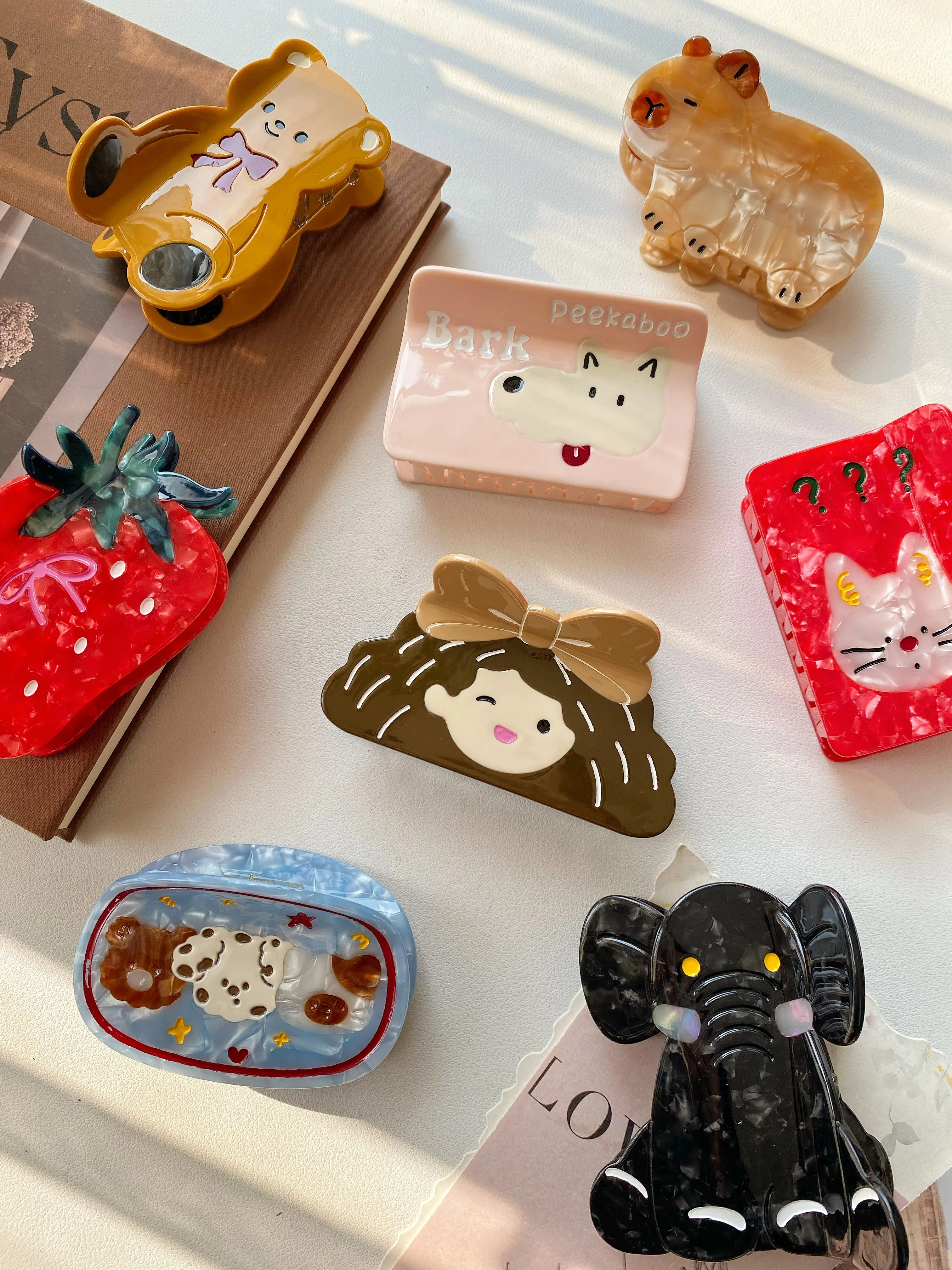 

Girl's Squirrel, Bear, Elephant, and Capybara Hair Claw Clips: Niche Acetate Material, High-Quality Fashion Trend.