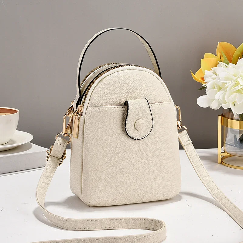 TRAVEASY Brand 2025 New Leather Phone Crossbody Bag Woman Luxury Brand Versatile Shoulder Bag Underarm Business Lady Handbag