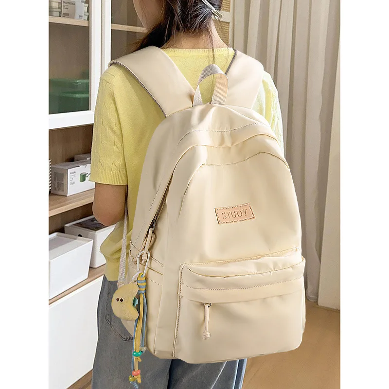 large-capacity-casual-backpack-for-high-school-girls-double-shoulder-bag-elementary-middle-school-students-female-model