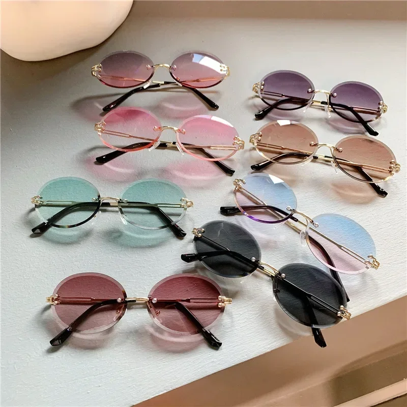 

Gradient Color Uv400 Ultraviolet-proof Sunglasses Frameless Cut Edge Trendy Sun Glasses Oval Small Round Sunglasses for Women