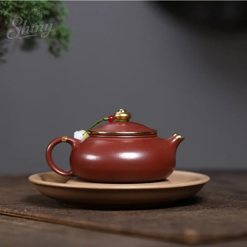 Handcrafted Zisha Teapot with Dragon's Blood Sand, Ball-Hole Design, Gilded Accents, Cold River Tea Set for Gongfu Tea