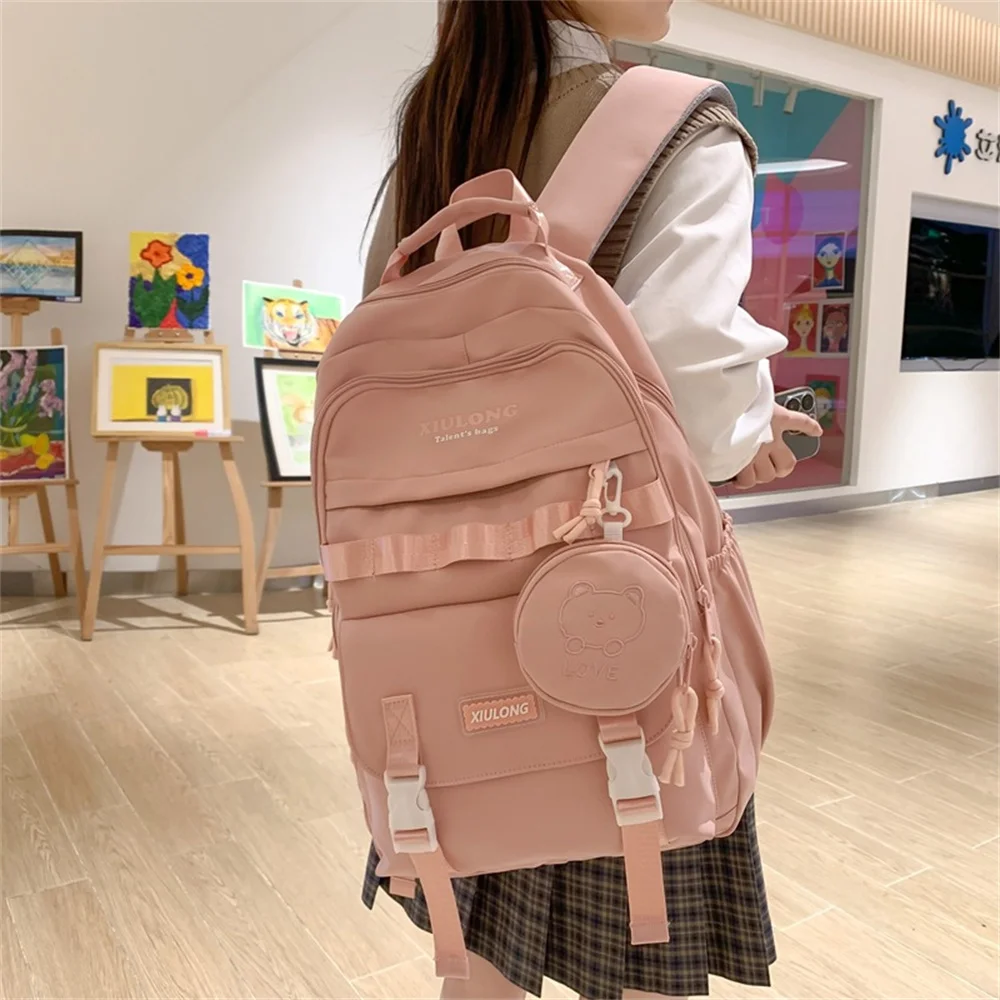 Tas sekolah nilon warna polos perempuan, tas ransel kapasitas besar Korea modis, tas ransel siswa sekolah menengah, dompet koin lucu