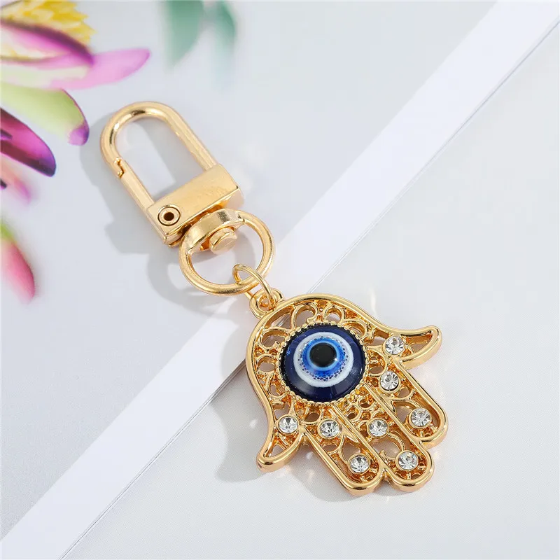 Image 4: Porte Clef Arc-en-Ciel Mauvais Œil Bleu pour Amis ou Amoureux, Accessoire Maléfique, Main de Fatima, Bling pour Sac, Airpods, Voiture, 1 Pièce