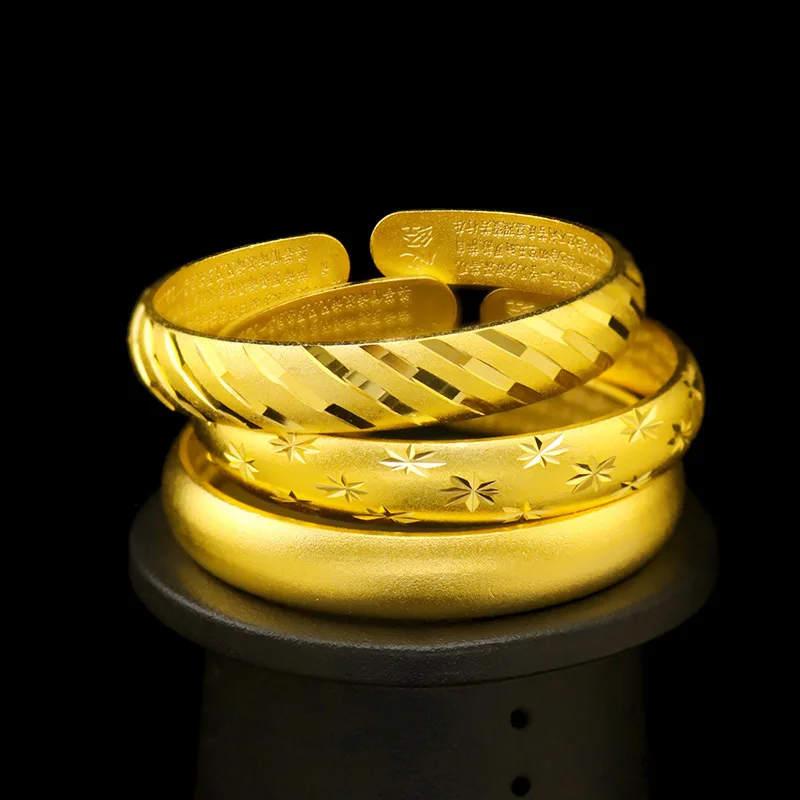 9999 gold bracelet featuring ancient method's Heart Sutra, open Heart Sutra hand ring with sand-like surface, meteor shower