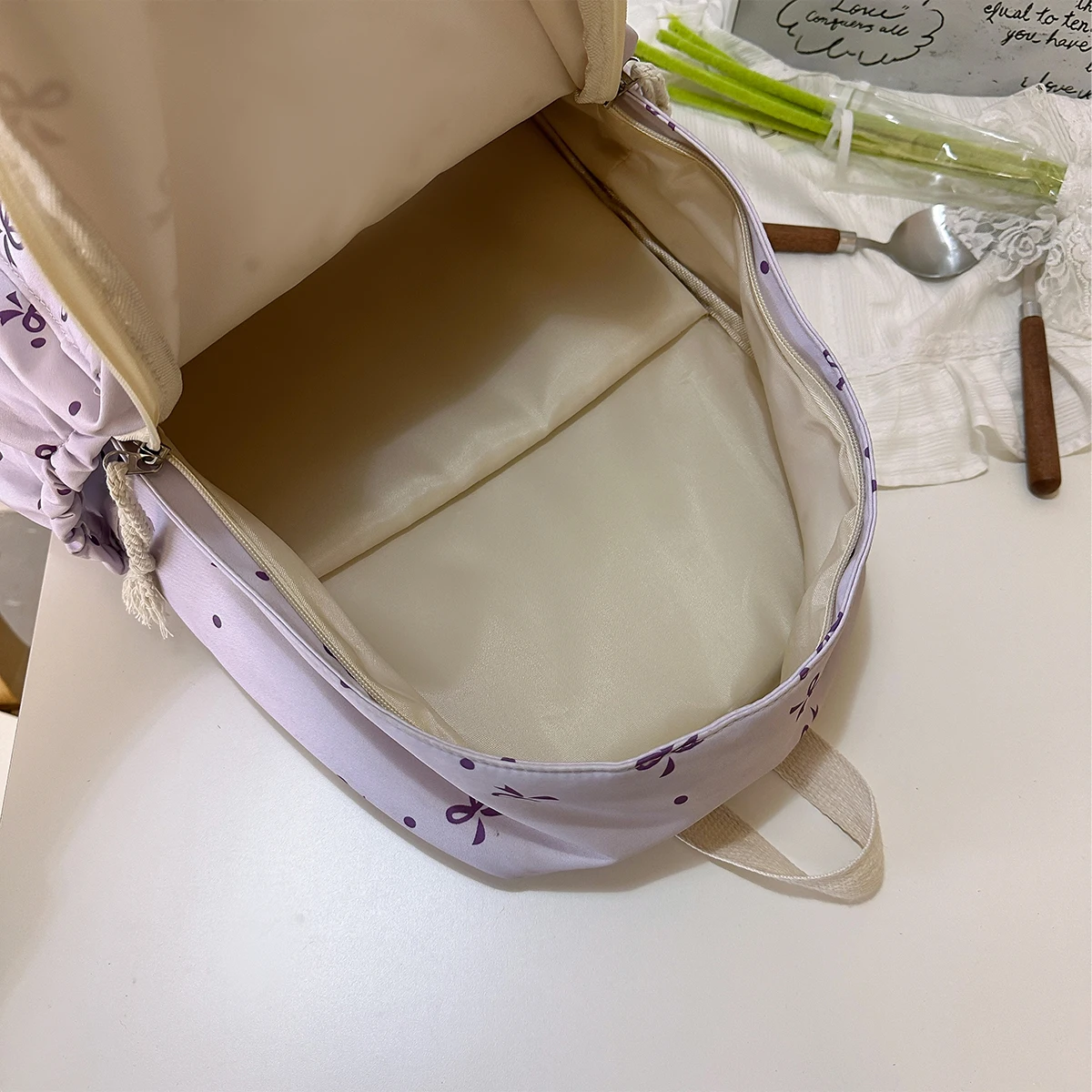 حقيبة ظهر نسائية عصرية - حقيبة مدرسية من النايلون بطباعة فيونكة ونقاط مع أشرطة قابلة للتعديل ومقصورات متعددة للكلية والعمل #4