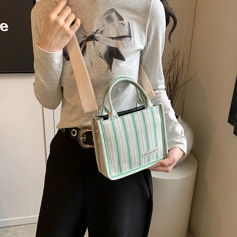 2024 New women\'s shoulder bag Square bag Fashion matching color striped pattern Delicate compact high-end design Mom Female girl