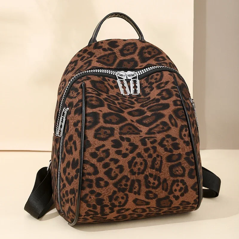 Mochila de nylon com estampa de leopardo 2025 alça macia de alta qualidade alça de ombro curvada mochila elegante bolsa simples e versátil