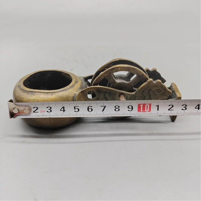 Antique miscellaneous items: old leather shell brass , copperware crafts, woodworking line marker, tiger head ink mark