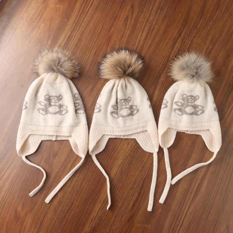 قبعة كشمير للرجال والنساء، قبعة سميكة من الصوف المحبوك للخريف والشتاء مع بوم بوم، حماية الأذن، وأسلوب عائلي