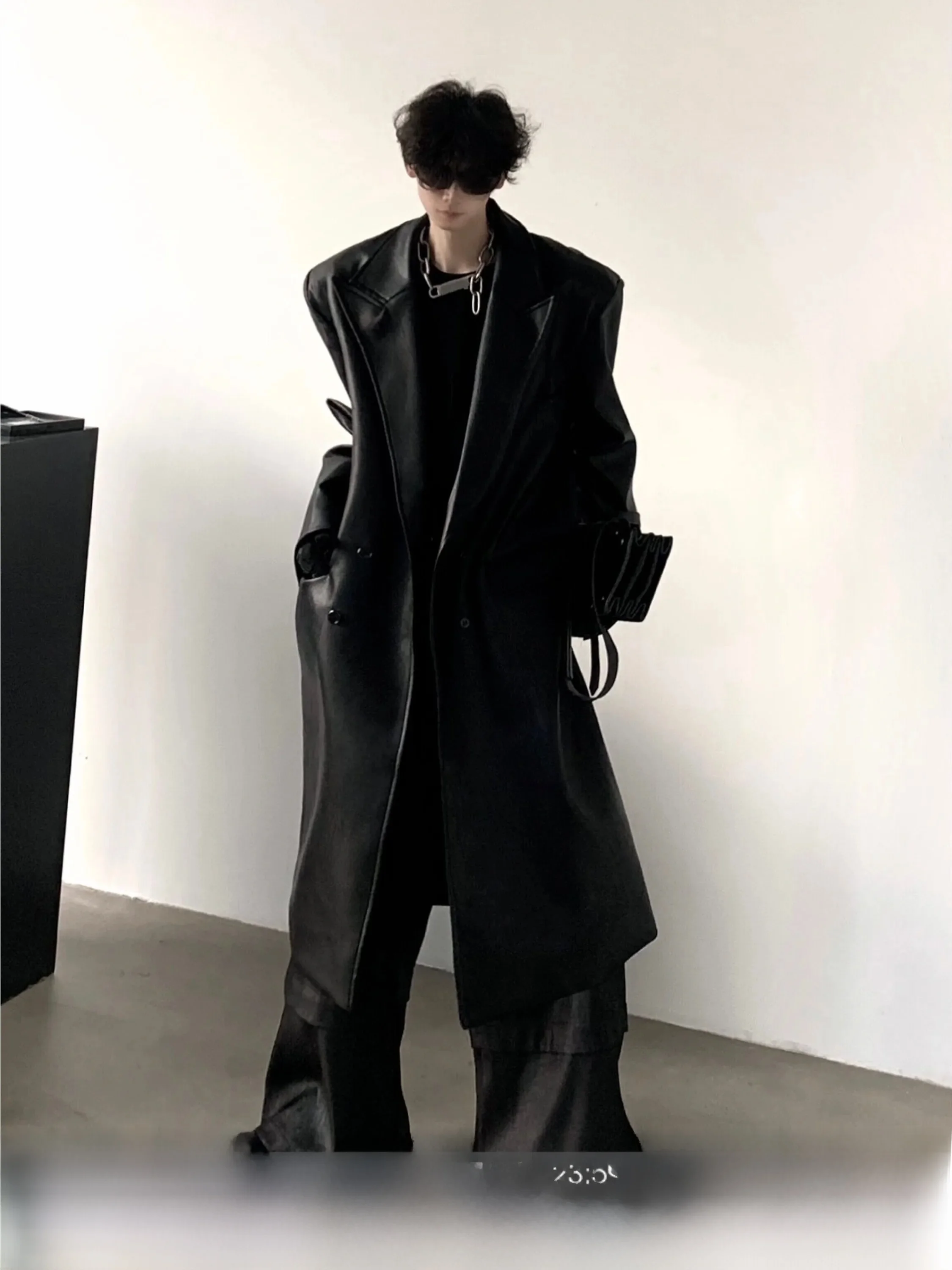 Fashionable Black Texture PU Leather Men's Long Over-Knee Coat Autumn Mountain Wind High-End Design Shoulder Pad Windbreaker
