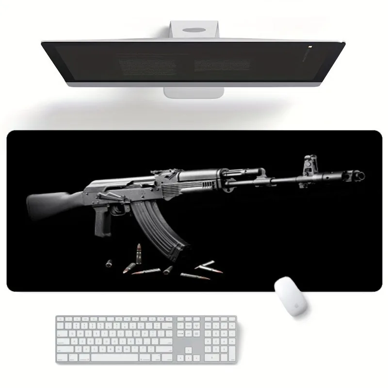 

Large game mousepad with an assault rifle design and anti-slip rubber base is durable and suitable for gamers and office use