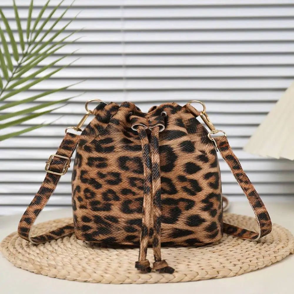 

Winter Leopard Bucket Bag for Daily Wear and Dates - Drawstring Crossbody Style