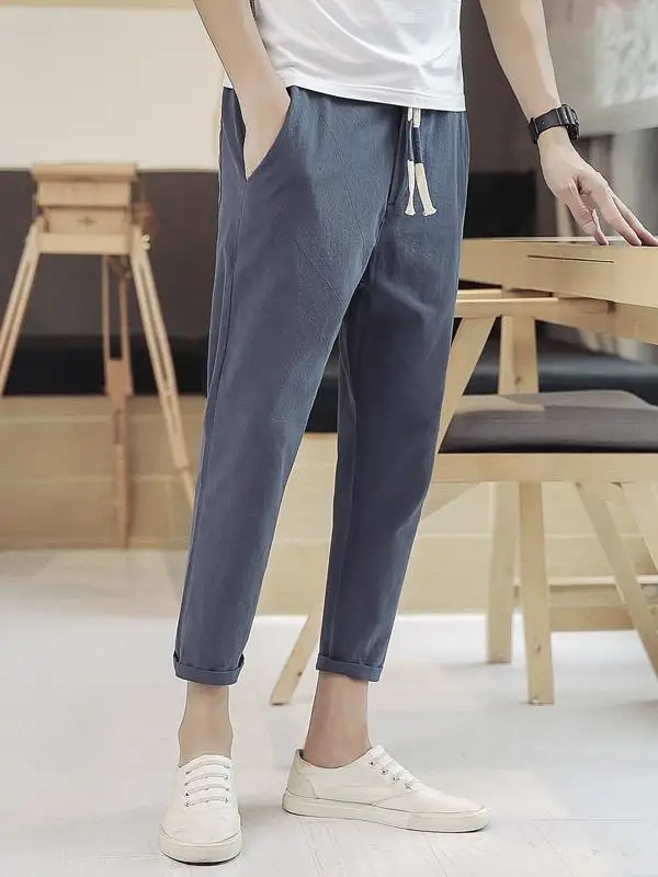 กางเกงขายาวผู้ชายผ้าฝ้ายลินินบางเบาใส่สบายทรงหลวมเอวต่ำสไตล์วัยรุ่น รุ่น Harlan 9 ชิ้น ทรงขาเรียวเล็ก