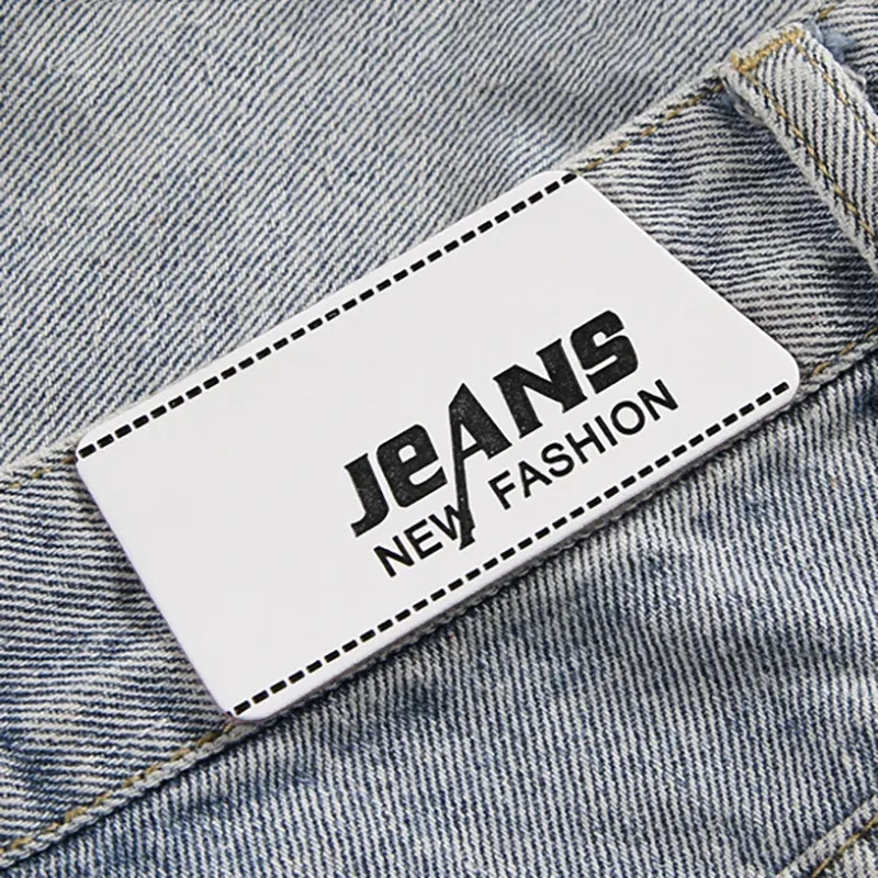 Custom Personalized Embossed Logo Sewing PU Leather Labels Tag for Clothes Garment Jeans view 2