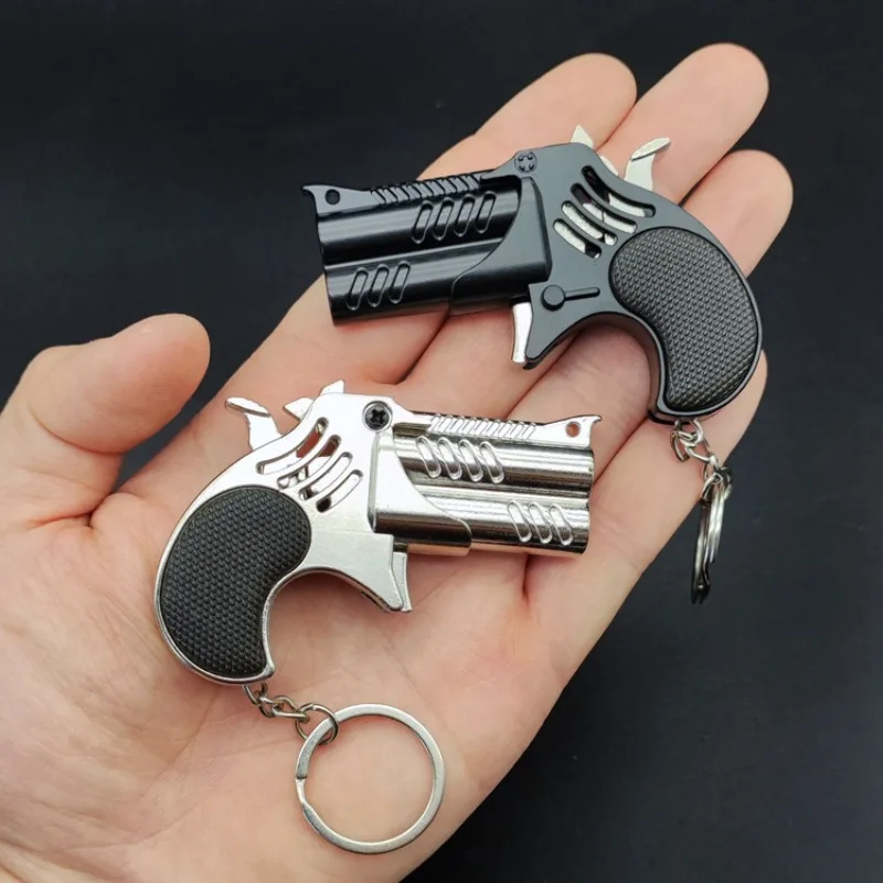 1Pcs Mini Keychain Metal Rubber Band Gun Game Toy Gun Launcher Children's Simulation Pistol Toys Gifts Pendent