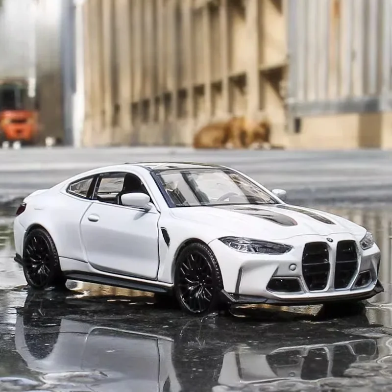 1:36 BMW M4 CSL diecast force back alloy simulation car model door can be opened children's collection decoration toy boy gift.