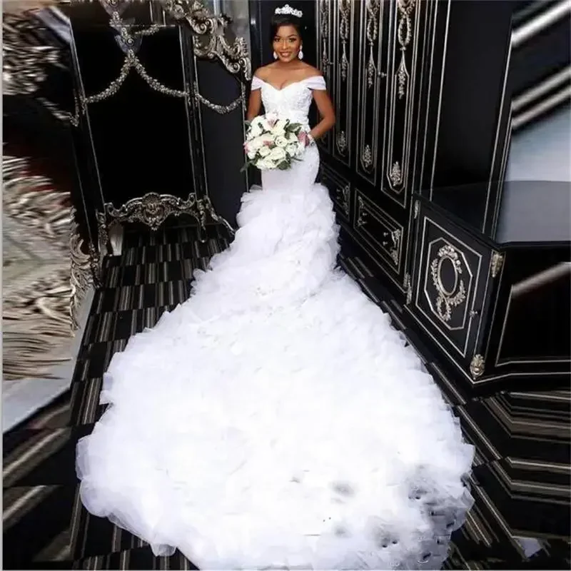 

Customized Mermaid Wedding Dresses African Saudi Off Shoulder Tiered Ruffles Lace Appliques Beaded Crystal Zipper Back Chapel Tr