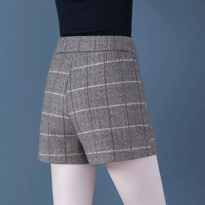 Semplicità Moda Autunno Nuove donne Plaid di lana Bottone con cerniera Coreano Casual Vita alta Allentato A-line Pantaloncini bootcut a gamba larga